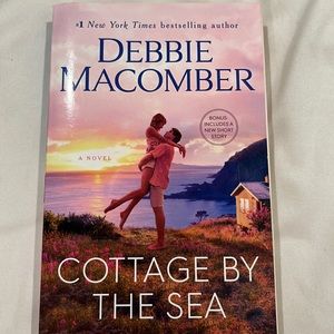 Cottage by the sea by Debbie Macomer
